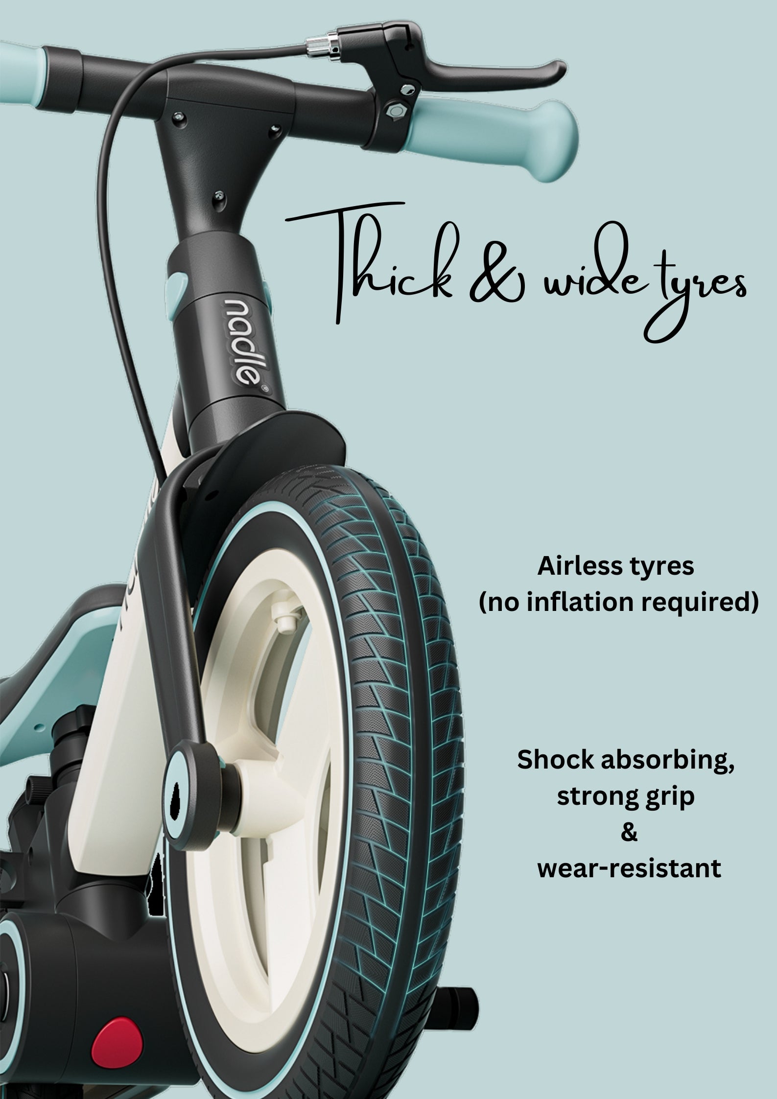 Close-up of a bike's thick, wide airless tires with features highlighted for durability.